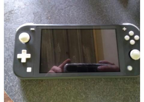 Nintendo switch lite and 3 games